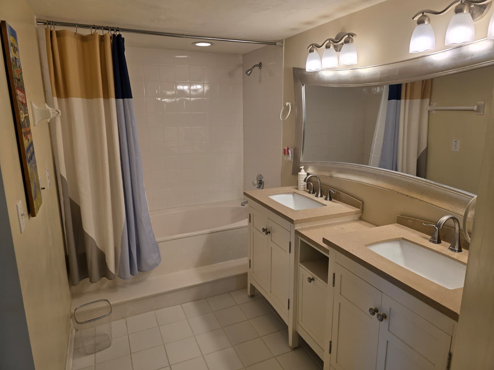 Ensuite bathroom 1 with dual sink and shower/tub combo