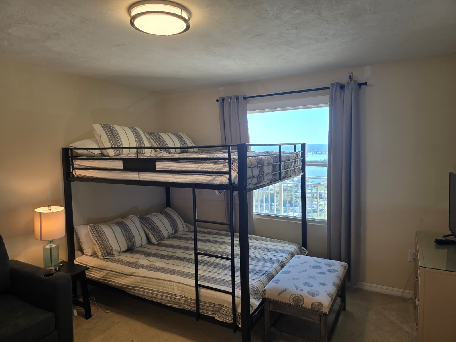 Queen-size bunk bed sleeps 4-people